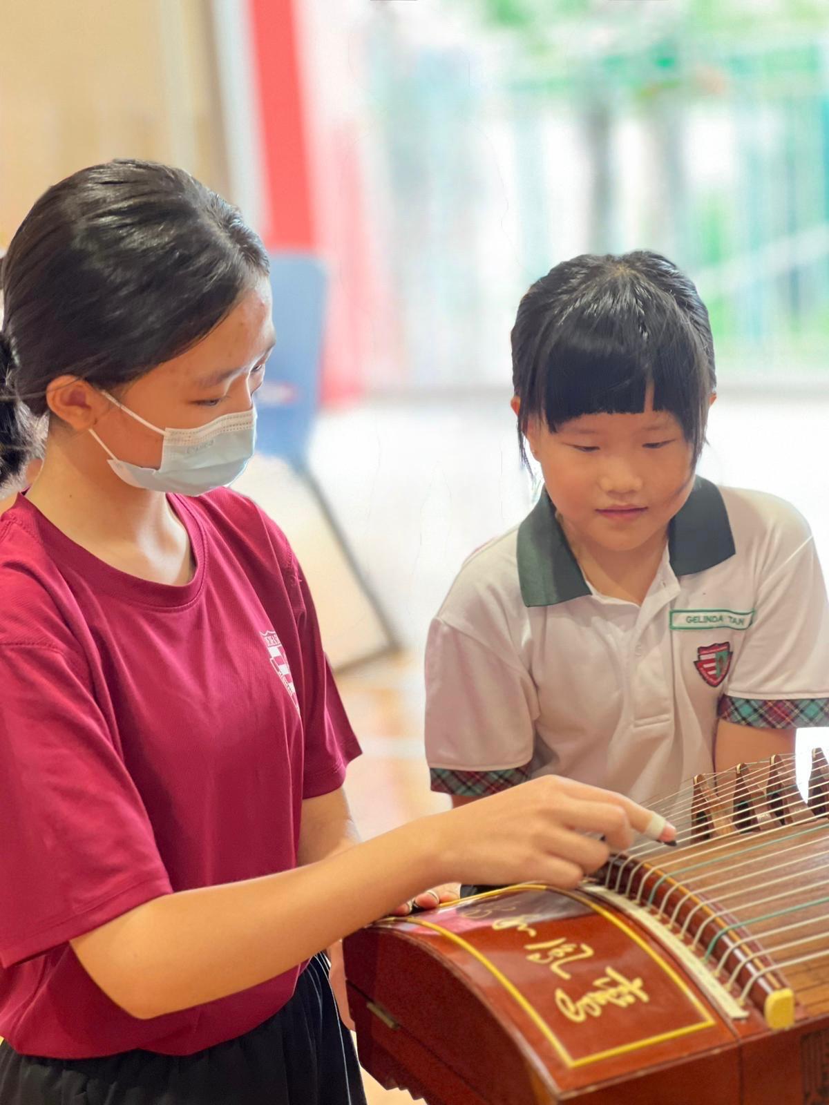 Guzheng CCA leader in action