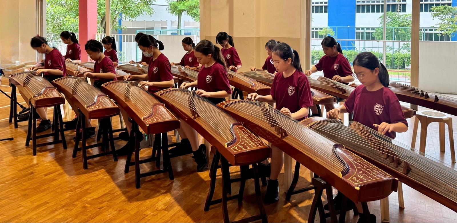 Guzheng members beaming with pride and confidence