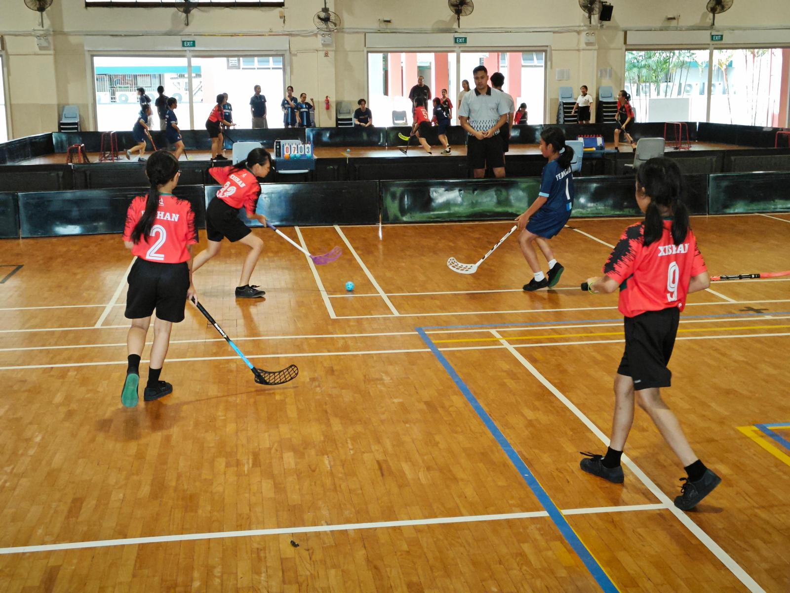 Junior Floorball Girls giving their best shot